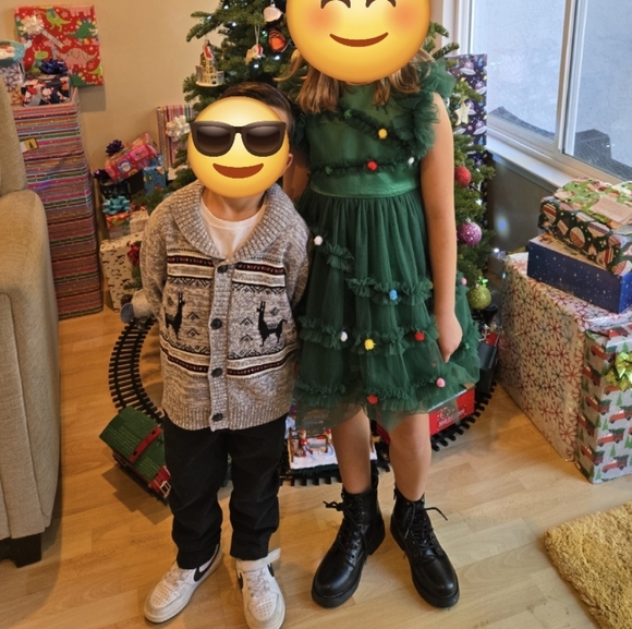 Festive Green Kids Dress with Pom-Poms - Picture 3 of 3